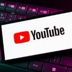 In this photo illustration a YouTube logo seen displayed on Viral Greece