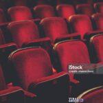 Empty comfortable red seats with numbers in cinema Viral Greece
