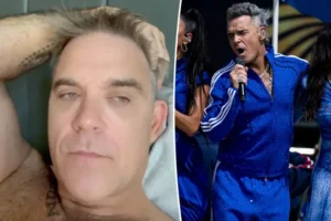 Ρόμπι Γουίλιαμς: Η αλήθεια για το λευκό αντικείμενο που έπεσε στο μικρόφωνο στον τελικό του Μουντιάλ